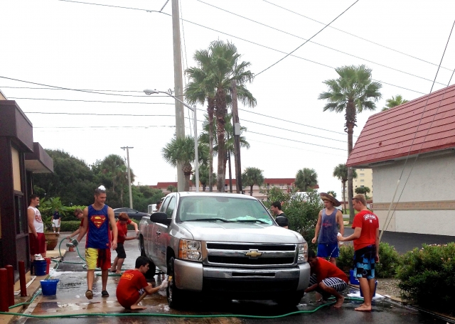 Cadets spend a Saturday morning raising money for the program at the Car Wash 