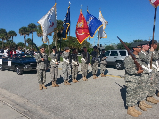 The Male and Female Color Guards in the Homecoming Parade